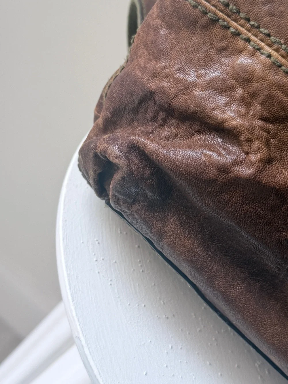 Hyper Distressed Fossil Vintage Bag.